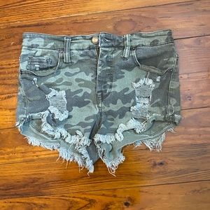 camo print ripped denim shorts
